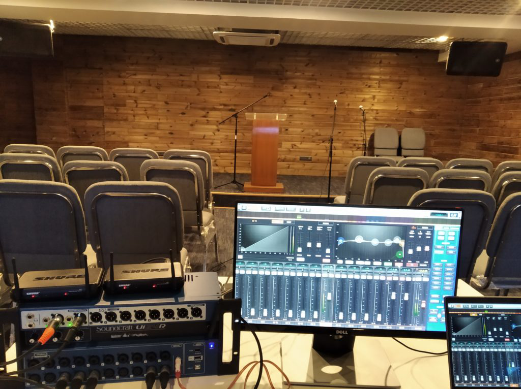 An audio system setting in an auditorium