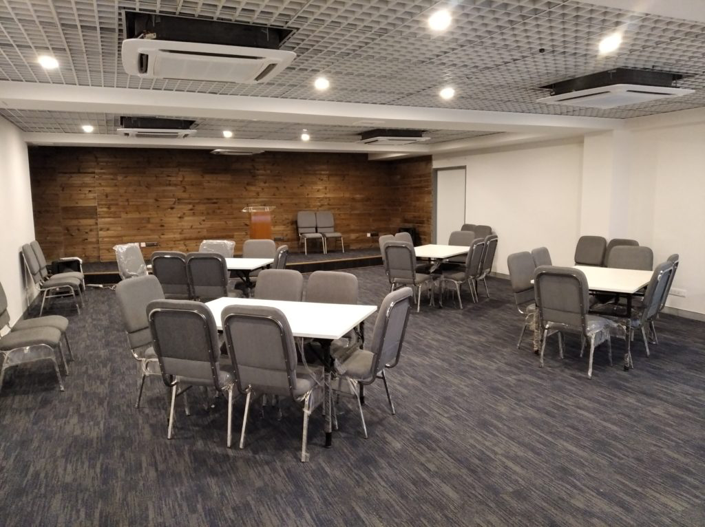 Well organized group of chairs and tables for events