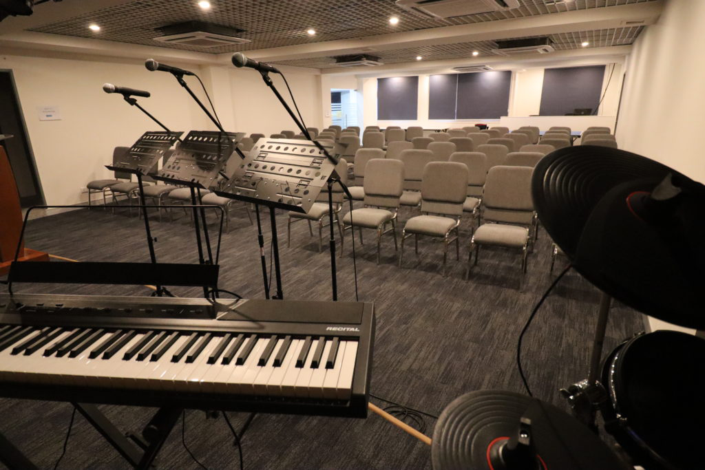 Conference hall with instruments and audience seating arrangement